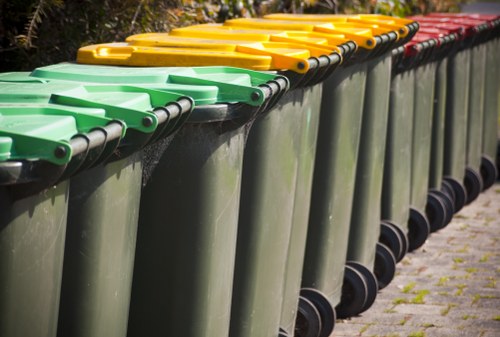 Professional rubbish collection trucks in Stratford